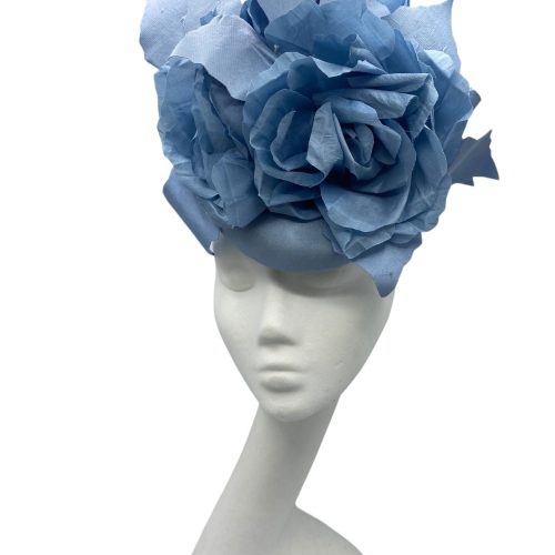 Stunning steel blue headpiece with matching handmade silk flowers.